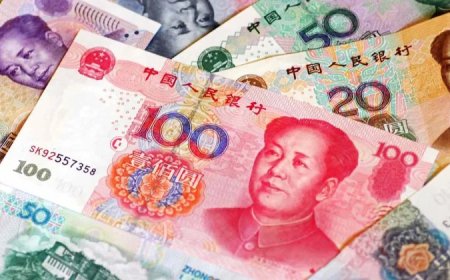 Chinese banks raise dollar deposit rates to counter yuan strength