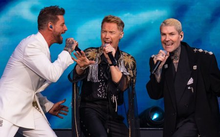 Mikey Graham says he's 'close to tears' during emotional speech at Boyzone's farewell gig - after sparking concerns by missing most of the concert
