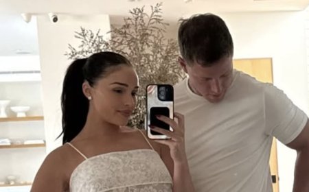 Pregnant Olivia Culpo shows off her baby bump in sheer lace outfit for romantic date night with husband Christian McCaffrey