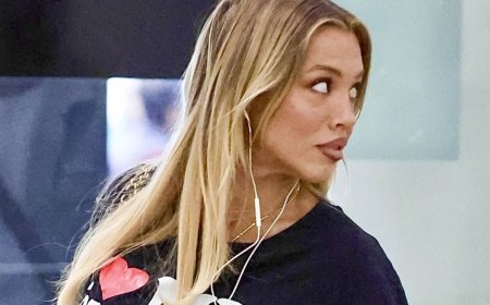 Tammy Hembrow, 32, sends a clear message to her haters as she and her much younger boyfriend, 23, arrive at Sydney Airport