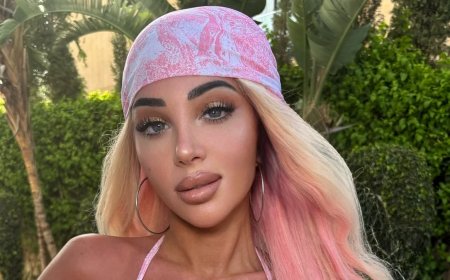 Tulisa debuts new pink and blonde locks as she sizzles in skimpy bikini after returning to the stage following Bell's palsy attack
