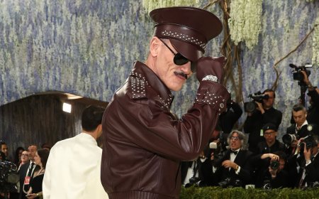 Luke Evans declares Met Gala fashion is 'so boring for men because women get the fun costumes' after he modelled a head-to-toe leather look