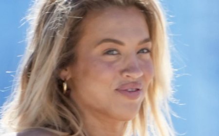 Tammy Hembrow, 32, packs on the PDA with her 'toy boy' boyfriend, 23, on the Gold Coast