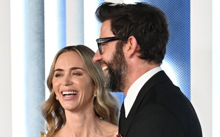 Emily Blunt dazzles in a plunging cream gown as she enjoys a red carpet date night with John Krasinski at the Disclosure Day premiere in New York