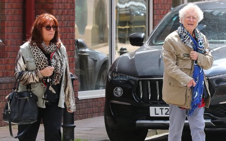 Slade's Noddy Holder looks happy and healthy as he celebrates his 80th birthday with wife Suzan - six years after being given just six months to live amid battle with throat cancer