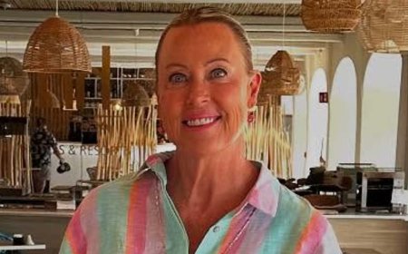Lisa Curry suffers 'packer's regret' as she wheels luggage jam-packed with 'outfits of the day' through the airport - and reveals her travel hack
