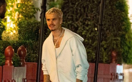 Romeo Beckham and Kim Turnbull enjoy dinner with pals in Paris after he walked the runway for Willy Chavarria during Men's Paris Fashion Week