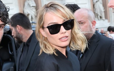 Margot Robbie ignores the UK heatwave in covered up look as she joins Janet Jackson at star-studded RH London launch party