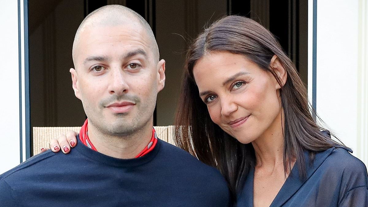 Katie Holmes, 47, cozies up to her new toyboy beau as romance heats up during New York date