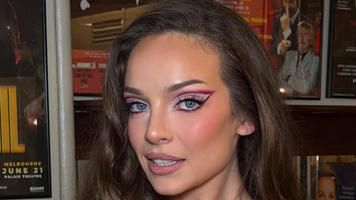 Abbie Chatfield flashes her undies as she slips into edgy outfit including latex corset and sheer skirt for her 'Loves Men' tour