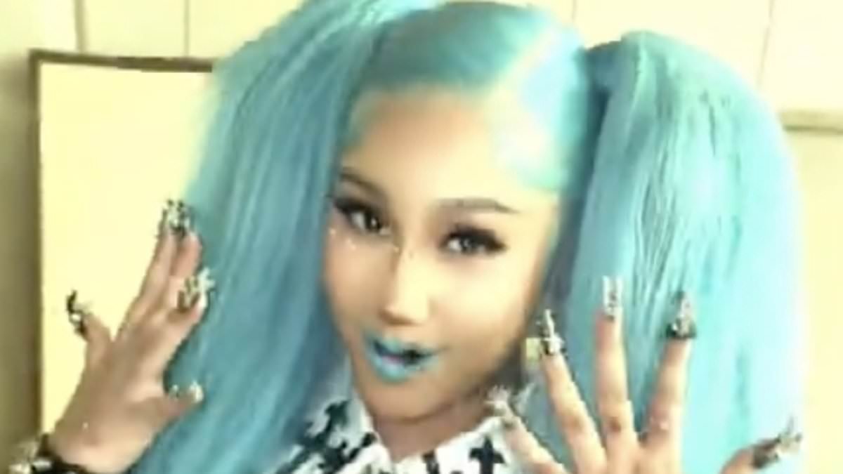 North West, 13, shows off face 'piercings' AGAIN in new video as mom Kim Kardashian promotes her tour after receiving criticism
