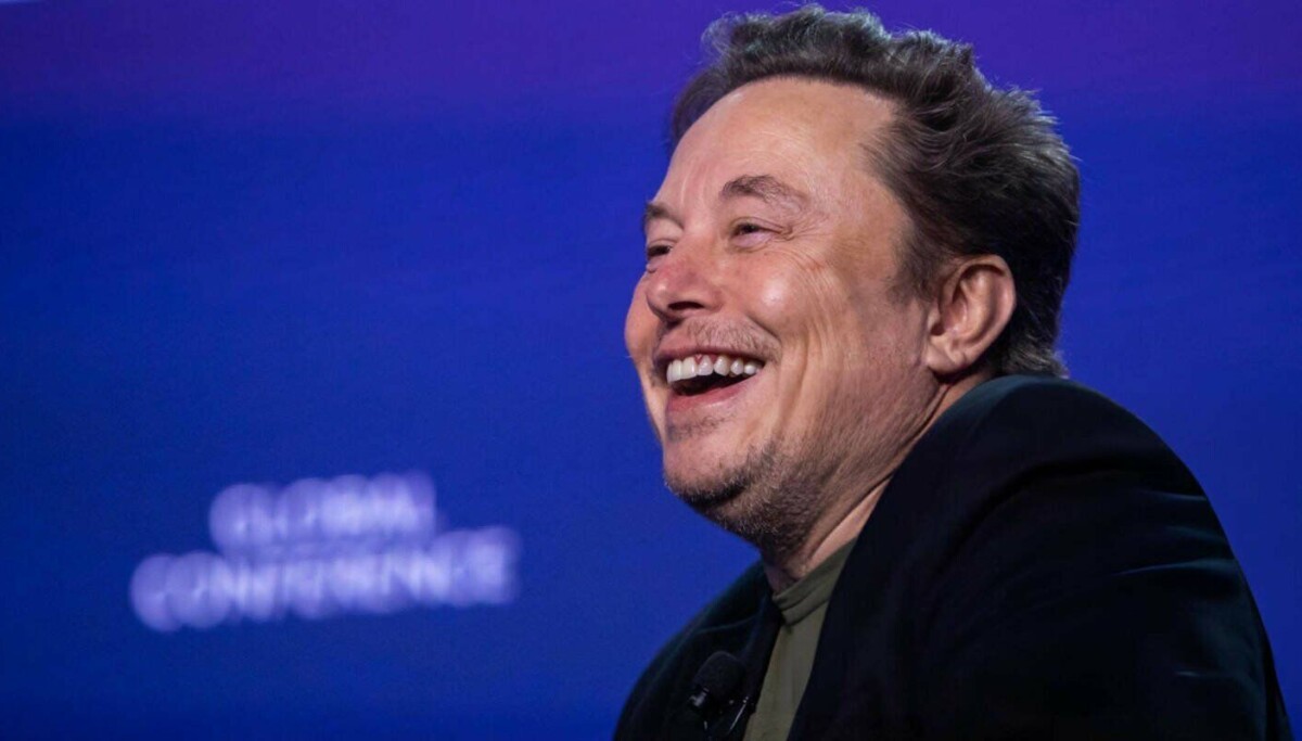 Tesla burns through a billion as Musk bets the farm on chips and bots