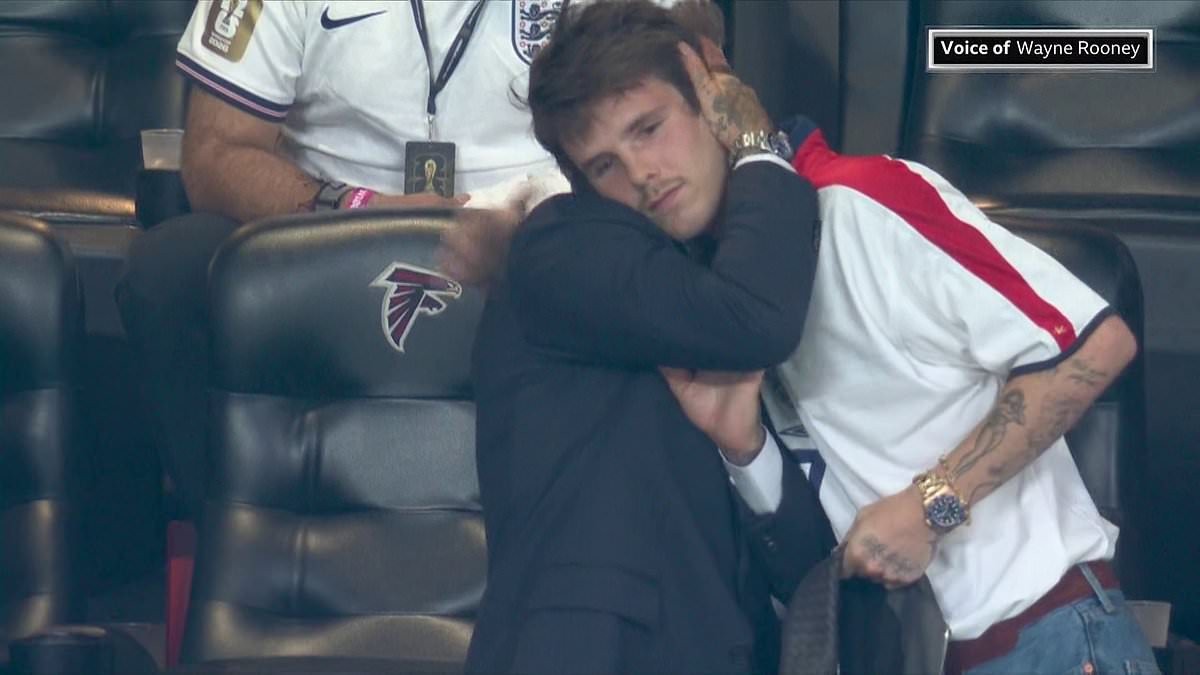 Cruz Beckham wins praise for consoling devastated dad David with a heartfelt hug in 'wholesome' moment as England crashed out of World Cup