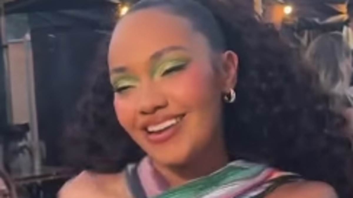 Pregnant Leigh-Anne Pinnock shows off her bare baby bump in a colourful crop top as she performs at Lazydays Festival ahead of welcoming third child with Andre Gray