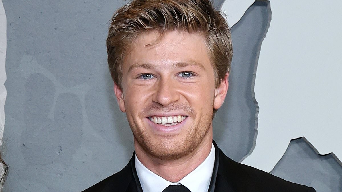 Robert Irwin proudly steps out with American girlfriend Ashleigh Scully - after it was revealed his family had 'concerns' about his new romance