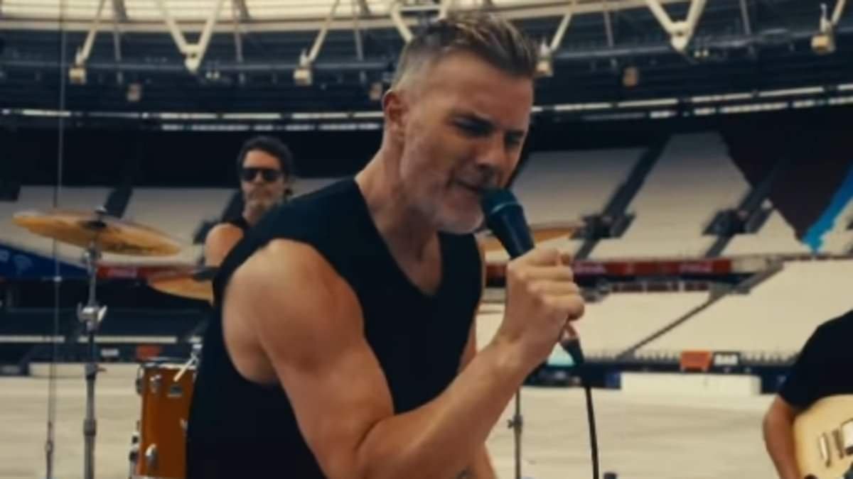 Gary Barlow, 55, sends fans wild with his incredible glow up as he shows off his bulging biceps in a vest after checking into £6.5k wellness clinic to prepare for Take That's Circus Tour