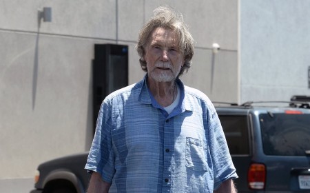 Aussie star, 80, who played villains in Mad Max 2 and Commando seen on rare outing in LA... can you guess who?