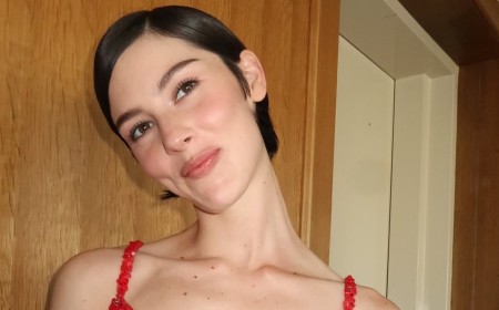 Gracie Abrams is called out as 'weird and unnecessary' for posting a photo of Taylor Swift's ex-boyfriend Joe Alwyn alongside a snap of her wedding outfit (which he then likes!)