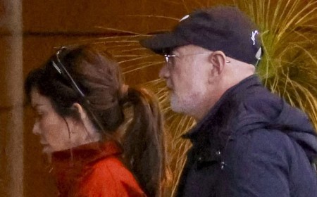 Lauren Sanchez steps out in a $7,000 designer jacket as she and husband Jeff Bezos return to Sydney's luxury Park Hyatt after whirlwind Harbour City getaway