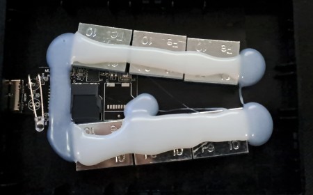 Redditor buys suspicious drives on eBay just to report the scamming sellers if they get a fake SSD or HDD — latest '16TB' find has weights and microSD card hot-glued inside the enclosure to make it feel legit