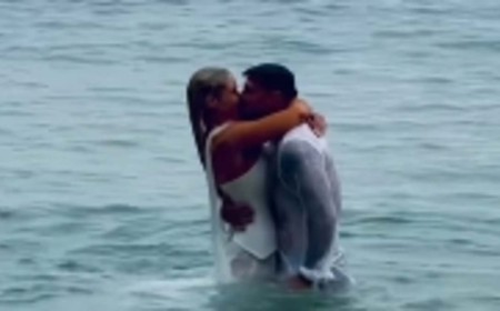 Love Island's Lucie Donlan runs into the ocean in her wedding dress with husband Luke Mabbott as they tie the knot in Cornwall after five-year engagement