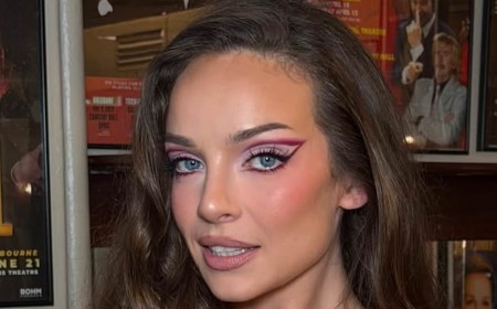 Abbie Chatfield flashes her undies as she slips into edgy outfit including latex corset and sheer skirt for her 'Loves Men' tour