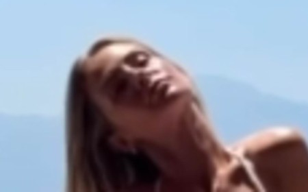 Millie Mackintosh poses in a white thong bikini during her healing getaway to Crete after falling into 'survival mode' following her split from husband Hugo Taylor