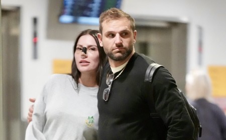 Married At First Sight groom Scott McCristal plays the doting boyfriend as he returns from Turkey with Brienna Stockdale following her nose job