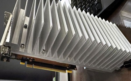 PC modder bolts 5.5-pound aluminum heatsink to RTX 4060 — convection-only cooling seems to work fine in a testbench-style installation