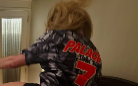 Ellie Goulding celebrates in a football shirt as she reveals she will perform at halftime during the England vs Norway World Cup match