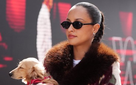 Charles Leclerc's wife Alexandra stuns in a fur jacket as she carries their dog Leo while British F1 driver George Russell and his girlfriend Carmen Mundt arrive at the British Grand Prix