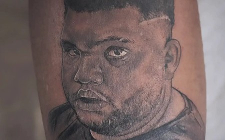 Katie Price unveils a HUGE new leg tattoo of son Harvey's face as she adds to her collection of 40 inkings