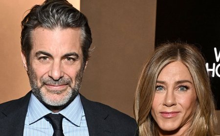 Jennifer Aniston proves she and hypnotherapist boyfriend Jim Curtis are still going strong after rumors of 'tension' in romance