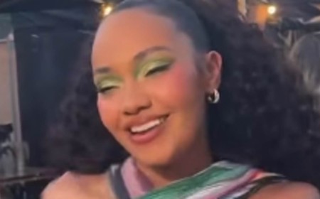 Pregnant Leigh-Anne Pinnock shows off her bare baby bump in a colourful crop top as she performs at Lazydays Festival ahead of welcoming third child with Andre Gray