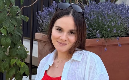 Pregnant Holly Ramsay cradles her growing baby bump in a red swimsuit as she enjoys the heatwave with husband Adam Peaty amid new family fallout