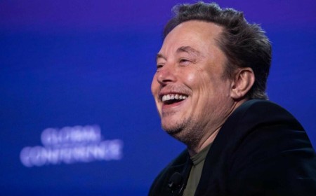Tesla burns through a billion as Musk bets the farm on chips and bots