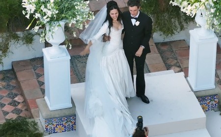 Gabbriette Bechtel reveals her wedding dress was made by avant-garde celebrity fashion label Matières Fécales after she tied the knot with The 1975 frontman Matty Healy