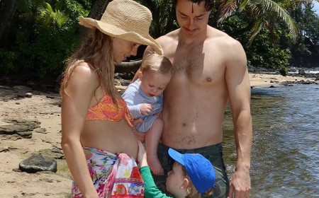 DJ Tigerlily shows off her baby bump in skimpy bikini in Hawaii as she announces she's expecting third child just one year after welcoming son