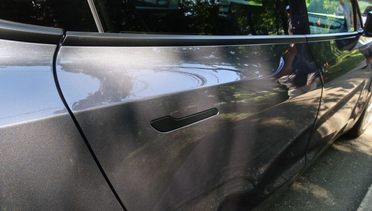 Tesla to recall almost three million vehicles over hidden door handles
