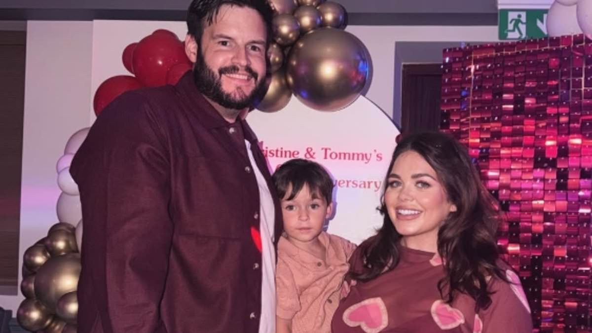 Scarlett Moffatt shows off her baby bump in a heart print dress as she kisses fiancé Scott Dobinson ahead of welcoming their second child