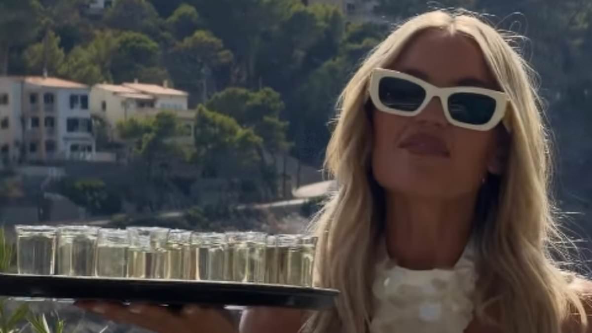 Love Island's Molly Smith carries a tray of shots and shares videos of her boozy wedding party after police were called to day two of her raucous celebrations with Tom Clare