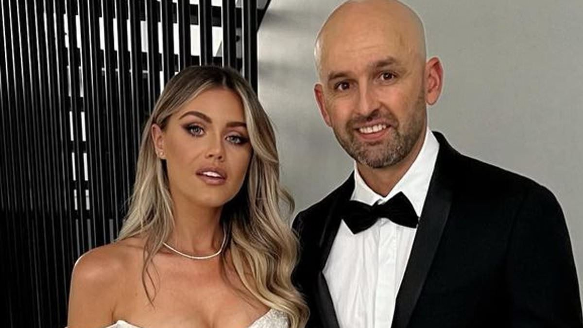 Emma Lyon cuts a stylish figure as she announces she's expecting second child with cricket star husband Nathan