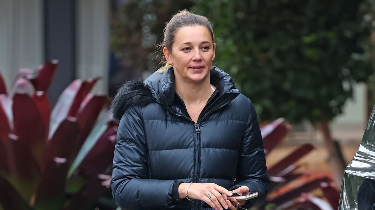 Casual Karl Stefanovic steps out in Ugg boots as his wife Jasmine slips into tight activewear while running errands after she has a spray at a magazine for 'lies' about their recent Europe trip