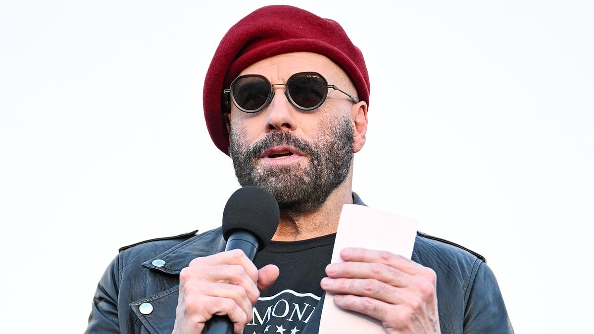 John Travolta rocks ANOTHER beret at Ramones 50th anniversary tribute... after fans mercilessly roasted his 'kooky' style
