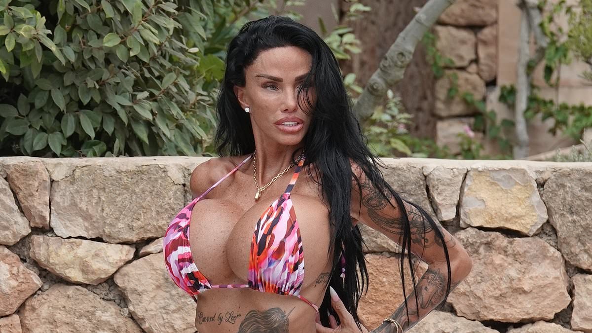 Katie Price showcases the full extent of her surgically enhanced cleavage in a tiny string bikini as she continues to soak up the sun in Ibiza
