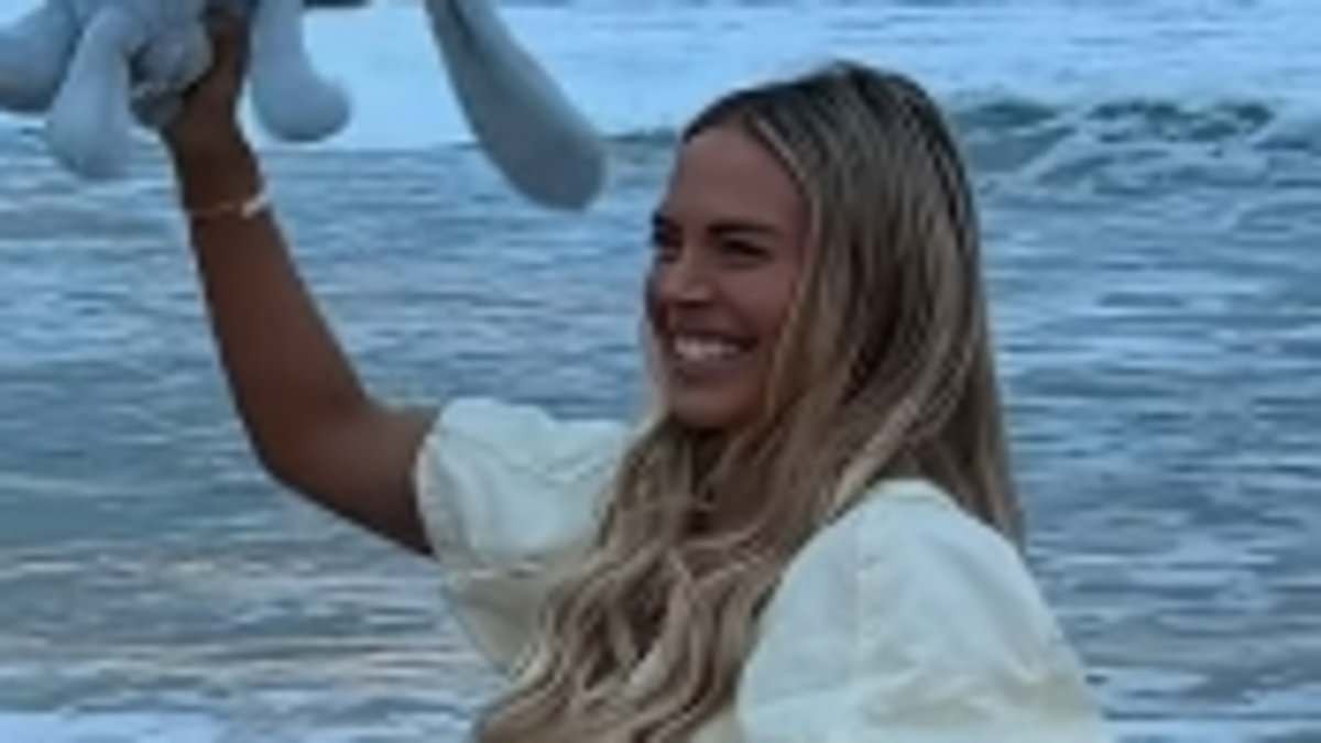 Bachelor star Cass Wood reveals she's having a boy as she hosts intimate gender reveal celebration
