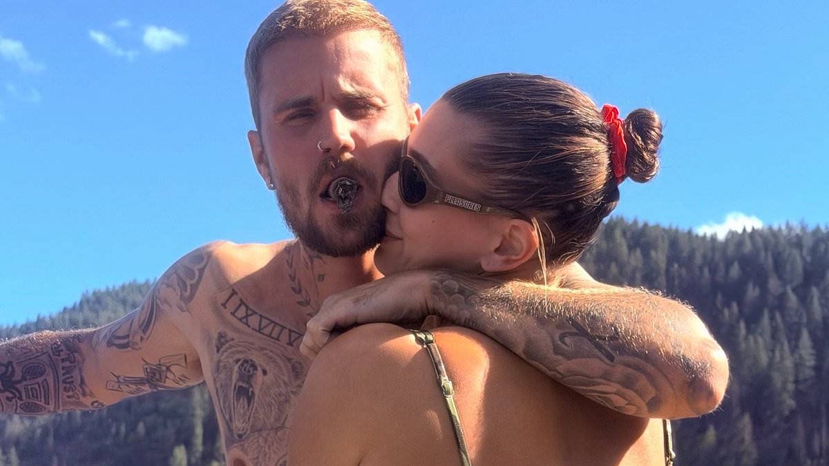 Shirtless Justin Bieber shares a rare PDA with bikini-clad Hailey as they enjoy a boat day with friends