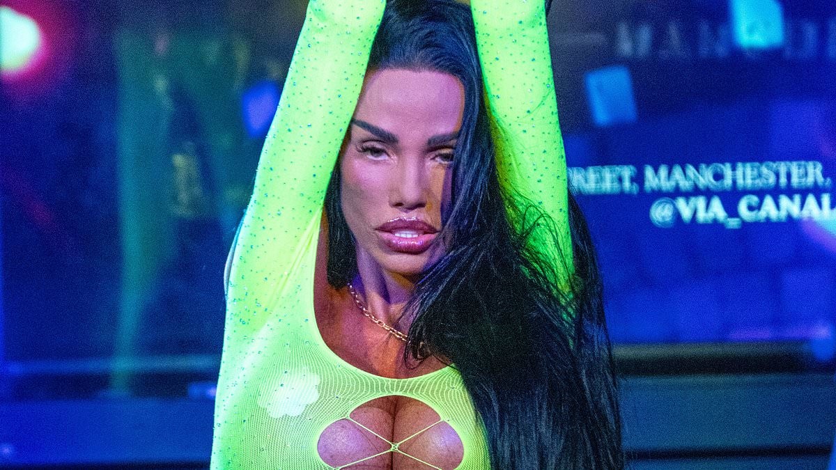 Katie Price lets her hair down as she performs her hit I Got U in very racy cut-out neon leotard at Manchester Pride