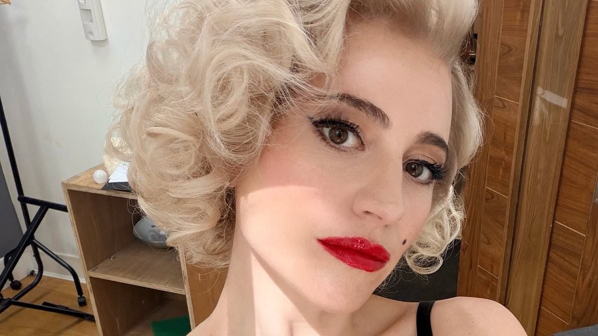 Pixie Lott has a 'Marilyn Monroe' moment with blonde curls and red lipstick as she poses in a lace bra