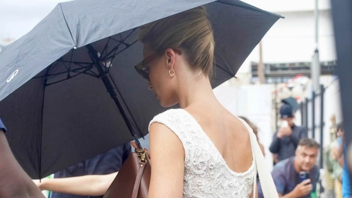 Margot Robbie looks elegant in white as she joins Bradley Cooper and Monica Barbaro on the set of the Ocean's Eleven prequel for the first time